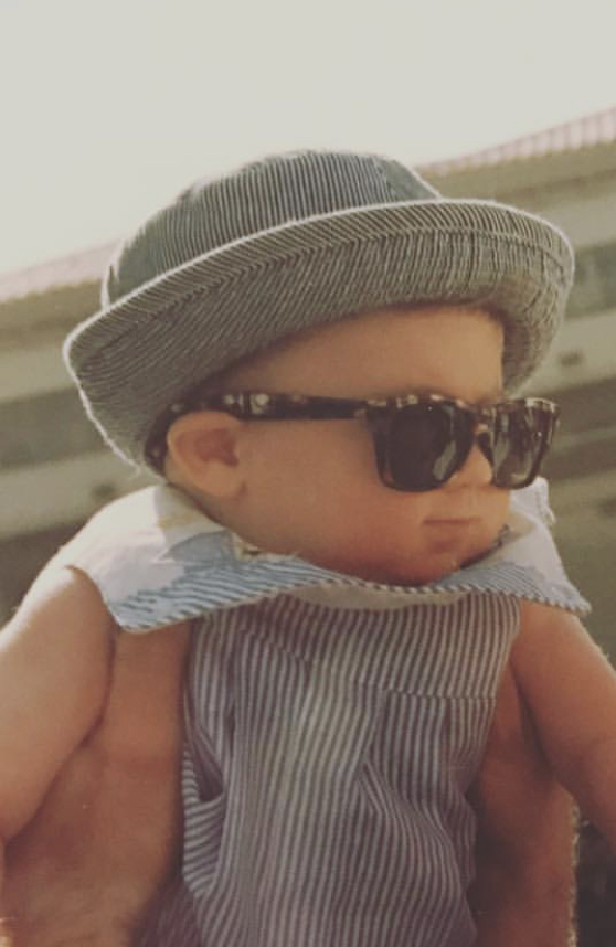 A younger Jack in a fedora and sunglasses